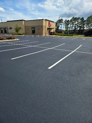 Freshly paved and striped commercial parking lot at a restaurant near Prattville, Alabama